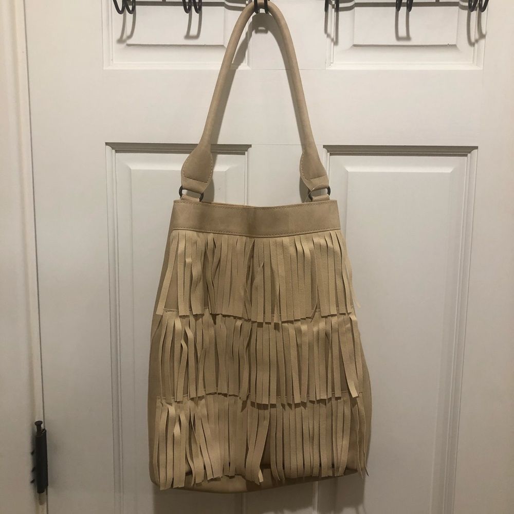 ✨5 for for $25! ✨ Tan fringed purse.